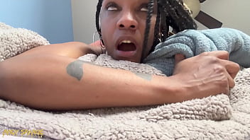 A black, busty MILF gives a deepthroat blowjob and squirts in this POV video